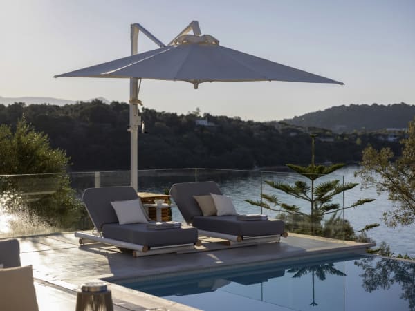 A shady spot by Pacifica's magnificent, 16m-long infinity pool.